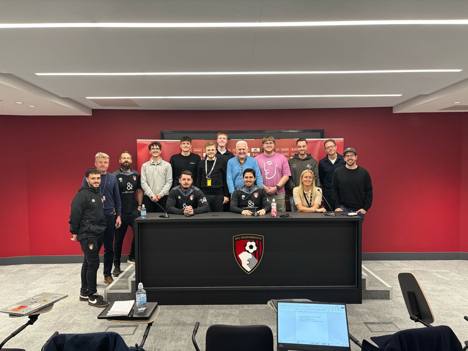 A picture of journalists and AFC Bournemouth media team members during the first press conference held at the new performance centre. Cherries boss Andoni Iraola is front and centre.